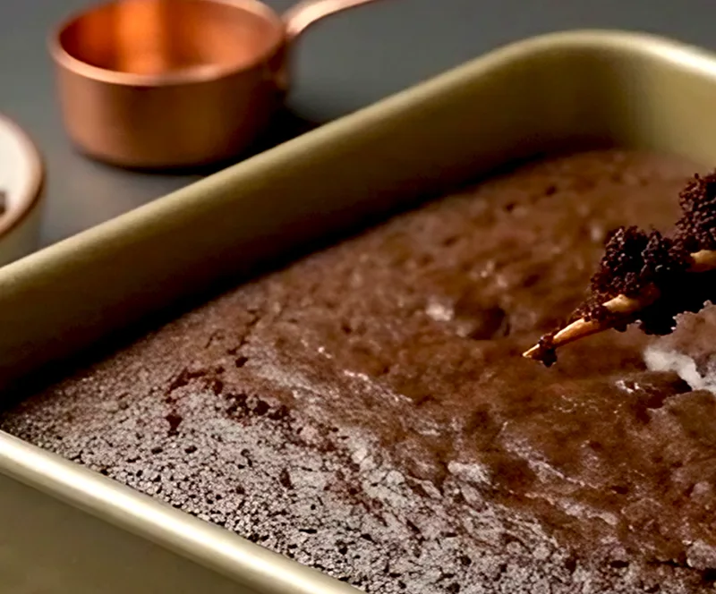 Take the cake out with moist crumbs on the skewer, not a clean one